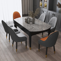 Chaise de salle à manger en bois massif de luxe dorée, dossier en cuir, chaise de salle à manger de restaurant de style nordique et moderne pour la maison.