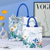 Sac fourre-tout à imprimé floral avec nœud en écharpe, grande capacité, imperméable, laminé, sac de shopping, logo personnalisé pour cadeau et trajets quotidiens