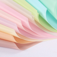 Fleur papier d'emballage couleur plastique usine directement vente léger emballage ordinaire artisanat papier artisanat matériel personnalisé