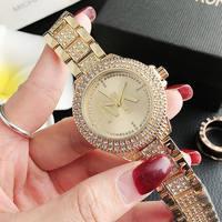 Reloj dorado Michael Kors: Lujo y estilo