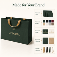 Sac en papier personnalisé 70 g/m² en carton recyclable avec poignées en corde et logo personnalisé en feuille d'or pour la vente au détail de luxe en gros
