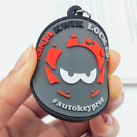 Porte-clés promotionnel rond en PVC souple de style simple avec logo personnalisable, code QR et numéro de téléphone