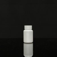 Pilulier en plastique blanc personnalisable de 60ml 75ml 100ml 120ml avec bouchon à vis à l'épreuve des enfants bouteille de capsule HDPE pour emballage liquide