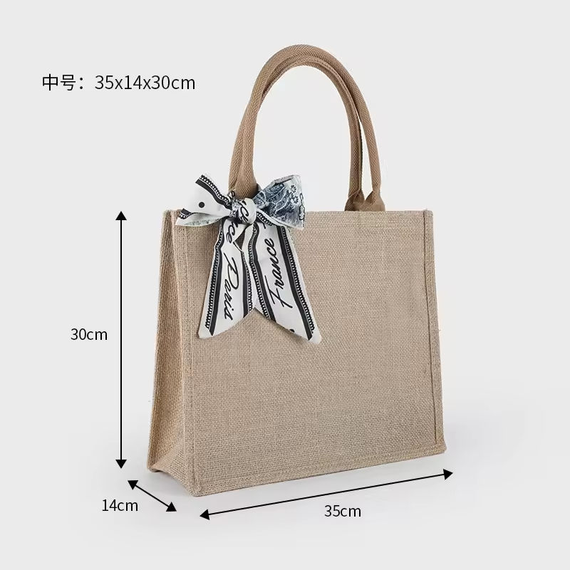 M avec ruban de soie