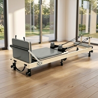 Appareil de Pilates Reformer pliable, modèle MJD W38A, avec structure en bois d'érable massif et pieds de support en acier, durable et sain.