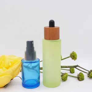 Flat shoulder 30ml 100ml 3.3 oz blue light green 60ml frosted glass dropper bottles with dark wooden lid