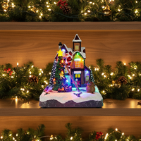 MELODY Train lumineux LED animé et rotatif, maisons de village de Noël en plastique avec 8 chansons de Noël, 3 piles AA