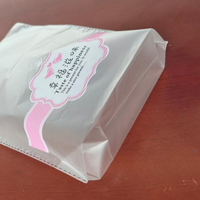 Sachet alimentaire mat givré en plastique avec imprimé pois et ruban rose pour emballage de biscuits, pâtisseries et desserts de boulangerie