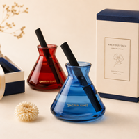 Diffuseur de parfum en verre coloré en gros avec bâtonnets noirs pour hôtels, spas et présentations de cadeaux