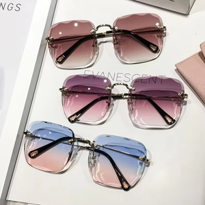 2025 Trending New Designer Rimless Shades Ladies High Quality Luxury Brands Women Sun <strong>Glasses</strong> Wholesale <strong>Fashion</strong> Metal Sunglasses - Product Image 1