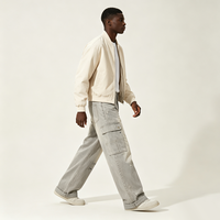 Jean cargo large en denim Kornit DTG avec imprimé vintage Eagle Garage Motor Label, poches à rabat double face et déchirures multi-cuisses et genoux