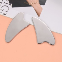 Planche Gua Sha en acier inoxydable 304, forme œil de mouton irrégulière, pour le raffermissement de la peau du visage et du corps, pour usage domestique et professionnel en soins de beauté