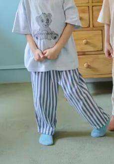 Blue and gray striped lace-up trousers