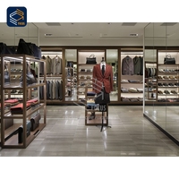 Dernière conception de vitrine métallique de magasin de créateurs, solution d'aménagement de boutique, présentoirs pour vêtements