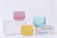 Nouveau sac d'été pour enfants en PU imperméable avec nœud papillon, mini porte-monnaie tendance, sac mignon de style occidental