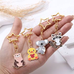 Lindo Llavero con Colgante de Animalitos de Dibujos Animados: Koala, Patito, Nutria, Mapache y Pentagrama - Product Image 4