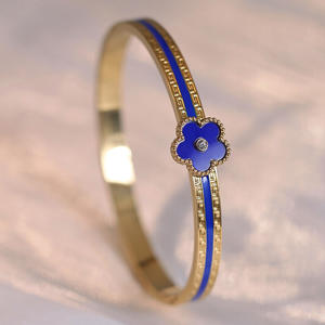 Bracelet unisexe en acier inoxydable avec pendentif trèfle à quatre feuilles en coquille blanche, plaqué or 18 carats, zircone, tendance et à la mode - Product Image 3