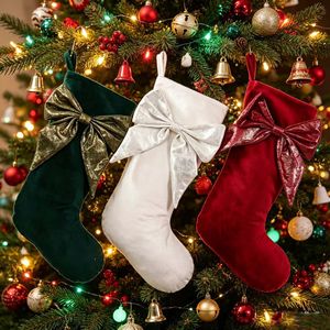 Nouvelles chaussettes de Noël en velours avec nœud décoratif 2026 pour la décoration de fêtes de famille, sacs cadeaux à suspendre à l'arbre de Noël pour bonbons - Product Image 1