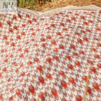 Tissu à paillettes Nanyee Textile populaire à imprimé hirondelles orange et blanches pour robe femme