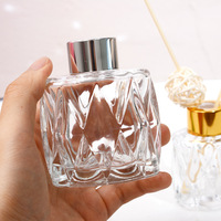 Flacon diffuseur de parfum vide 50ml 100ml avec bouchon en caoutchouc, surface taillée en diamant, logo personnalisé, rechargeable