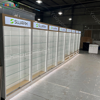 Étagère murale vitrée moderne avec éclairage LED, vitrine en verre trempé avec porte verrouillable et tiroir pour magasin de téléphonie et centre commercial