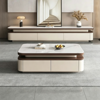 Ensemble table basse et meuble TV en pierre frittée, style minimaliste moderne, avec grands tiroirs de rangement et structure en bois, pour salon