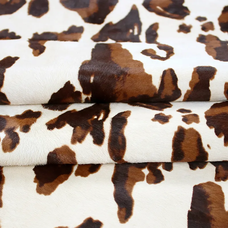 Brown Cow Print Stencil Over White Tanned Genuine Hair-on-hide Cowhide