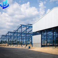 Kit de Bâtiment Commercial Préfabriqué en Acier : Garage, Atelier, Entrepôt à Structure Métallique Rouge avec Toit en Panneaux PBR et Panneaux R