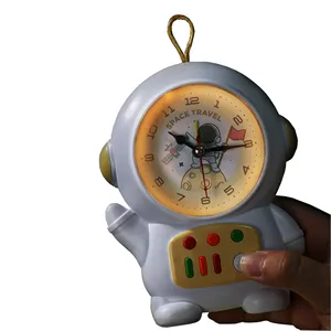 Fun astronaut alarm clock Manual Light plastic desk clock alarm for children's room