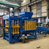 Système de fabrication de briques QT8-15 pour les entreprises de fabrication d'unités en béton, ciblées sur les projets de logement, de travaux routiers et commerciaux
