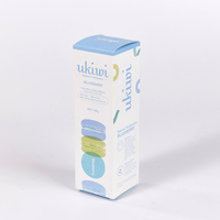 Boîte pliable à fond auto-scellant à imprimé dessin animé Macaron, carton vertical long pour dentifrice aux myrtilles