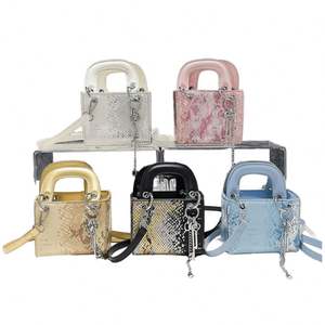 Conjunto de minibolsos minimalistas estilo europeo-americano 2024 para mujeres con bolso grande y bandolera de cuero suave - Product Image 1