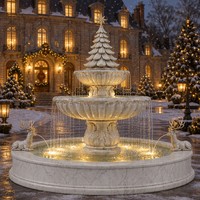 Fontaine de Noël en marbre blanc naturel pour l'extérieur avec un sommet en forme d'étoile et un renne pour la décoration de cour de villa de luxe