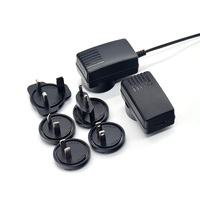 Chargeur de bureau interchangeable 12V 1.5A avec prise DC standard britannique, protection OVP/OTP/SCP, 18W CC-CV pour éclairage LED et usage médical