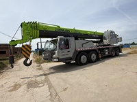Grue sur camion Zoomlion ZTC700 à cinq flèches, capacité de 70 tonnes, flèche télescopique, moteur Caterpillar, hauteur de levage de 60 m, grue d'occasion sécurisée