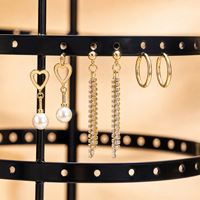 Support rotatif à quatre niveaux pour boucles d'oreilles, présentoir à bijoux en métal, organisateur rond pour boucles d'oreilles, pour comptoir de magasin