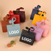 Distributeur portable de sacs à déjections canines en cuir, support de sacs à déjections pour animaux de compagnie d'extérieur avec logo personnalisé, pochette pliable pour sacs à déjections pour la promenade