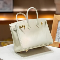 Sac à main de luxe en cuir véritable pour femme, style créateur, sac bandoulière tendance pour trajets quotidiens, vente en gros directe usine