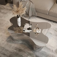 Table basse haut de gamme en acier inoxydable de forme spéciale, design unique de haute qualité, table basse miroir pour l'ameublement de la maison