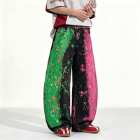 Jean coloré style streetwear à effet encre éclaboussée, délavé à dégradé, coupe ample, style urbain, pantalon large à coupe incurvée