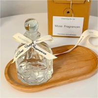 Bouteille d'aromathérapie transparente sérigraphiée de style Ins Diffuseur de roseaux en rotin sans flamme Design Tête de beauté volatile