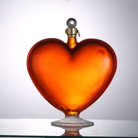 Bouteille en verre soufflé à la main de 1000 ml en forme de cœur pour spiritueux, vodka, vin et whisky – Vente en gros personnalisée et unique