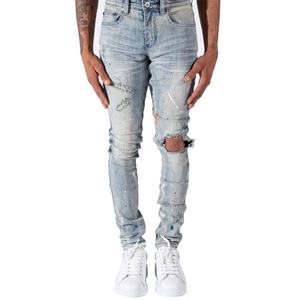 กางเกงยีนส์เดนิมทรงสลิมฟิตสีฟ้าอ่อนแบบมีรอยขาดที่เข่าและลายเพ้นท์สำหรับผู้ชาย - Product Image 4