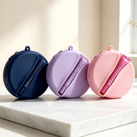 Pochette cosmétique ronde en silicone avec dragonne, fermeture éclair, étui de rangement portable pour rouges à lèvres et brillants à lèvres, organiseur d'écouteurs