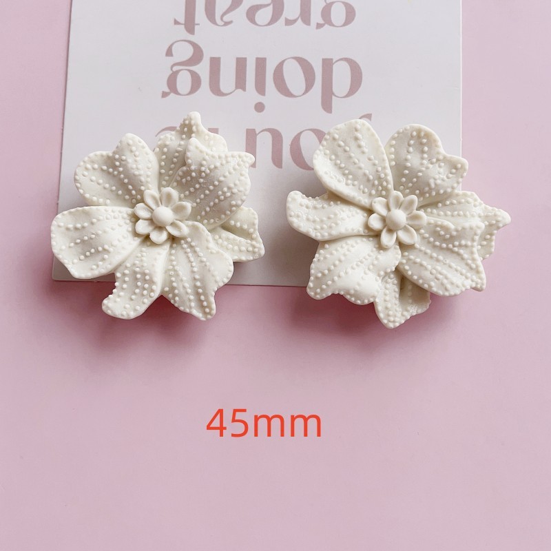 ลายดอกไม้จุดสีขาว - อุปกรณ์เสริมสำหรับรองเท้า Crocs
