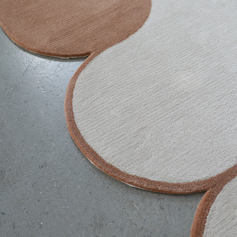Break away from traditional geometry and transform your floor into a piece of modern art! Featuring an eye-catching, abstract irregular contour, this plush accent rug adds effortless Scandinavian style, soft texture, and dynamic artistic energy to living rooms and cozy lounge corners.  Crafted with high-density, non-shedding fibers and a non-slip backing, it offers ultra-soft underfoot comfort while maintaining its vibrant aesthetic across homes in Bahrain!  Why You’ll Love It: • Eye-Catching Irregular Contour: Unique organic shape creates an instant artistic centerpiece for modern interior spaces. • Ultra-Soft Plush Feel: Soft, high-density pile provides warm, cozy underfoot comfort for relaxing or lounging. • Anti-Slip Protective Backing: Designed with a firm grip base to keep the rug securely in place on tile or hardwood floors. • Durable & Non-Shedding: Engineered with resilient, low-maintenance fibers that resist daily wear and tear. • Versatile Accent Placement: Perfect for styling under coffee tables, beside bedroom beds, or in reading nooks. - View 4