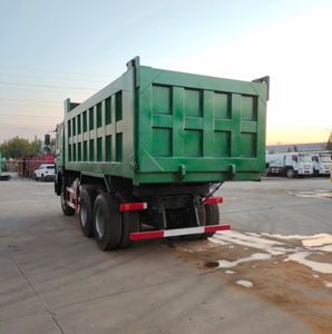 Camión pesado usado Howo 12 Wheels 450hp 25 Ton 8x4 Volquete volquete de dirección izquierda Precio bajo para la venta - Product Image 3