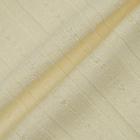 Tissu jacquard côtelé en TC Spandex 250 GSM durable, certifié GOTS GRS, respirant, tricot ajouré à œillets pour hauts de gamme