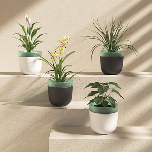 Maceta Moderna de Plástico con Absorción de Agua para Plantas de Interior, Diseño Circular, Color Blanco Oscuro - Product Image 1