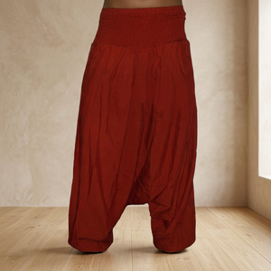 Pantalon sarouel ample teint en terre cuite avec design plissé et ceinture élastique haute pour hommes et femmes à vendre - Product Image 2